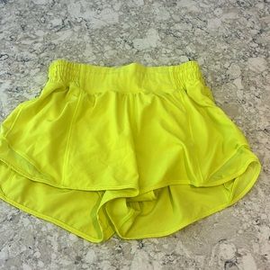 neon yellow high rise hotty hot shorts 2.5 inch size 4